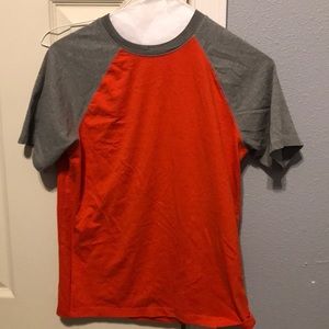 orange and grey short sleeved tee. size large.